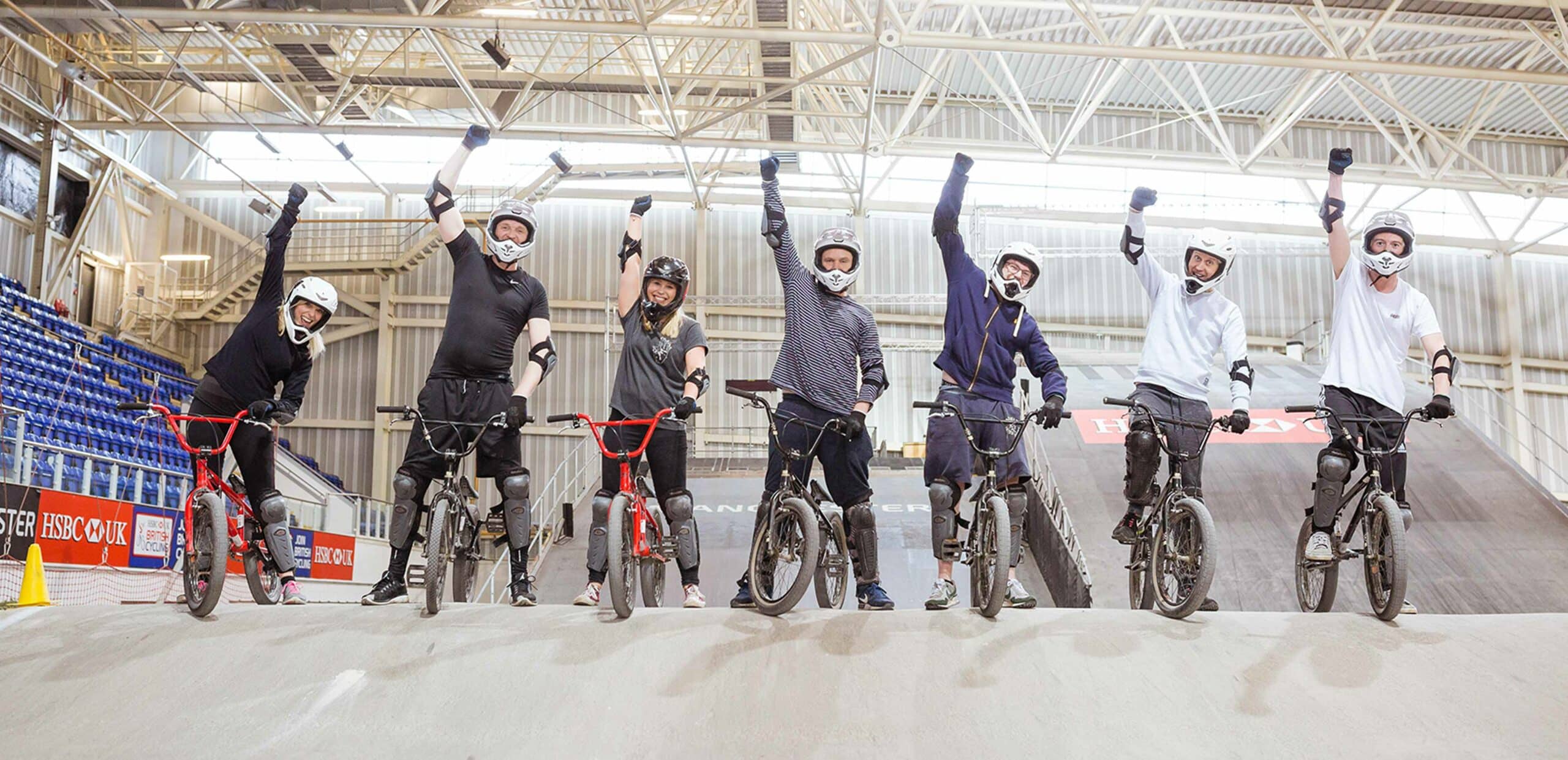 Group of People Riding BMX Bikes At The National Cycling Centre